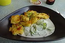 Flour dumplings with cucumber salad