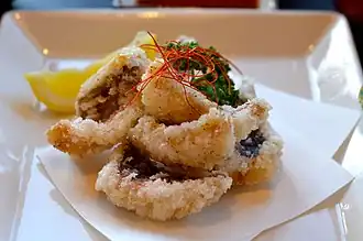 Deep-fried slices of gurukun fish