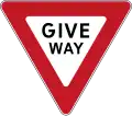 Yield sign, saying "give way" (same with the UK, Australia, New Zealand and Singapore)