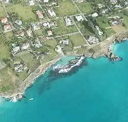 There does appear to be a small exit channel to the south of Sharks Hole but this was an unusually calm day.